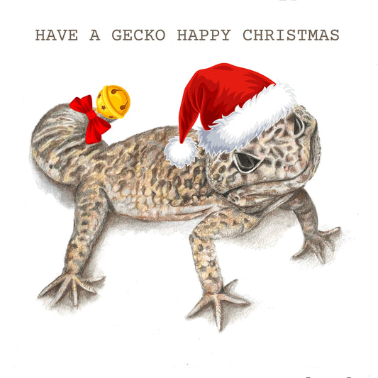 Leopard Gecko Christmas art. Gecko with red hat and bell on its tail and the words 'Have a gecko happy christmas'