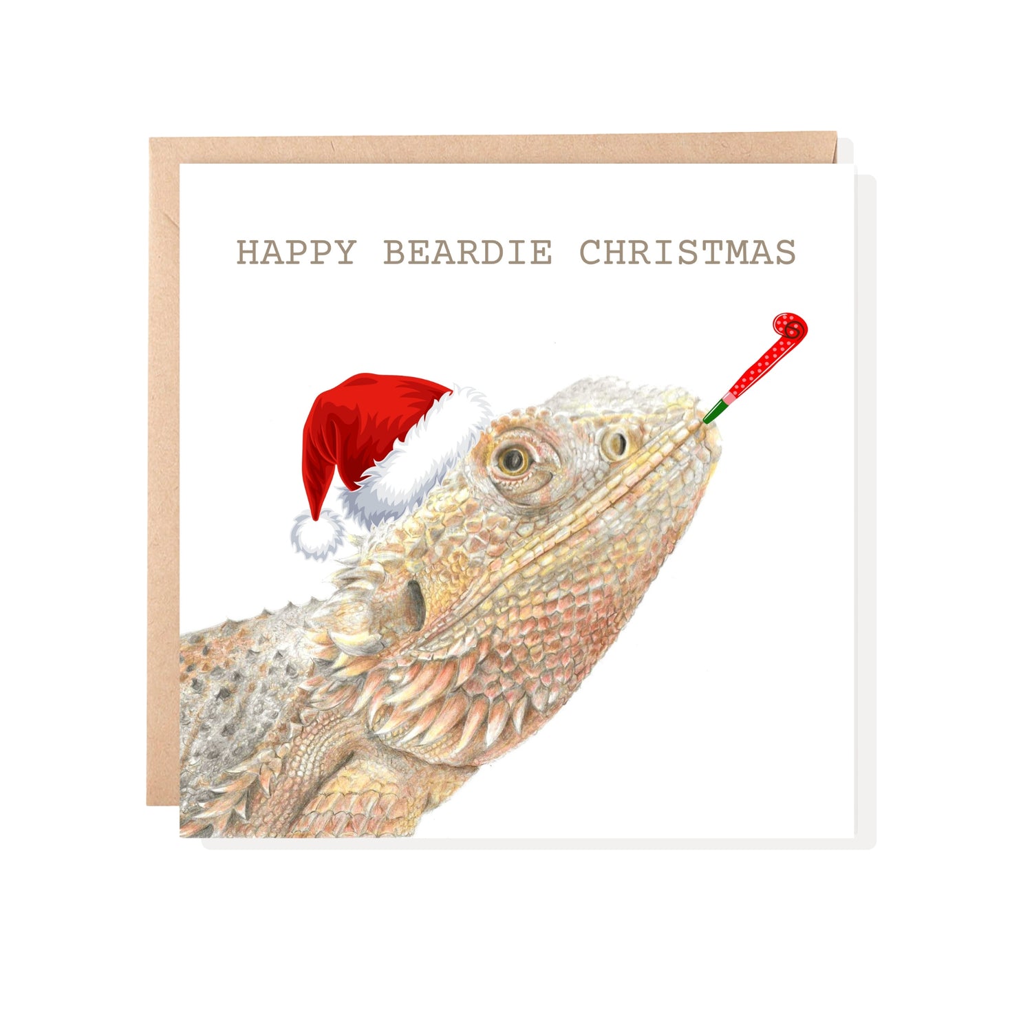 bearded dragon christmas card with red hat and party trumpet. Square card on brown envelope